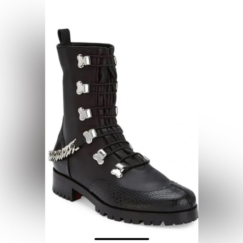 BNIB Christian Louboutin horse guards boots. 
Flat calf stretch upper Size 7.5